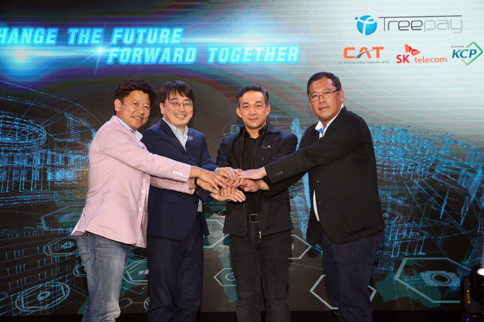 (From left) Jung Seung-kyu, EVP of NHN-KCP, Cha In-hyok, EVP of SK Telecom, Sanpachai Huvanandana, CEO of CAT Telecom, Suvicha Nalita, CEO of Tree Pay